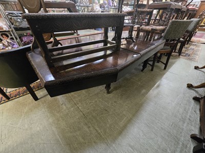 Lot 76 - An early 20th century oak extending dining...