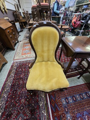 Lot 83 - A Victorian mahogany spoon back nursing chair