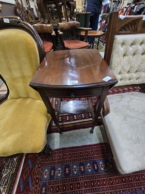 Lot 84 - A mahogany Regency style drop leaf occasional...