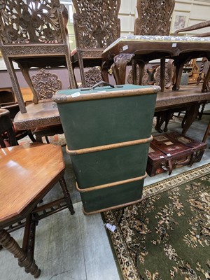 Lot 90 - A green canvas and wooden banded travelling trunk