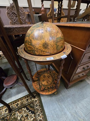 Lot 95 - A reproduction globe drinks cabinet