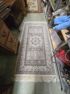 Lot 98 - A grey ground rectangular rug