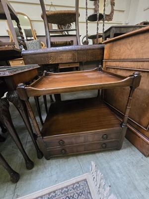 Lot 100 - A reproduction mahogany lamp table with two...