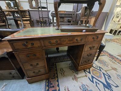 Lot 102 - A reproduction yew twin pedestal desk with...