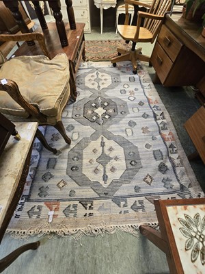 Lot 110 - A rectangular grey wool rug together with a...