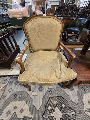 Lot 111 - A French walnut open armchair