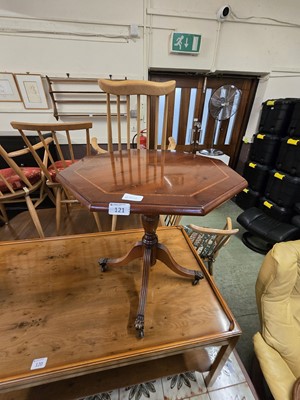 Lot 121 - A reproduction mahogany pedestal occasional table