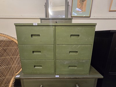 Lot 138 - A pair of green painted three drawer bedside...