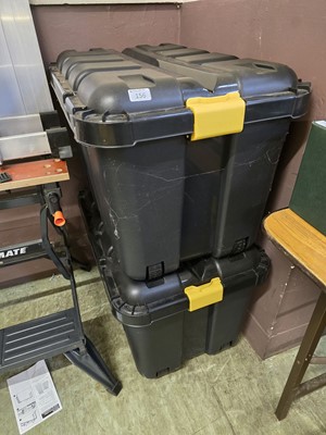 Lot 156 - Two large black PVC lidded storage boxes with...