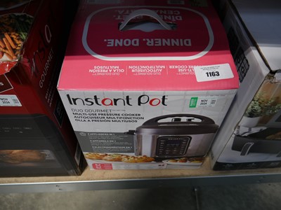 Lot 1163 - Boxed Instant Pot multi use pressure cooker