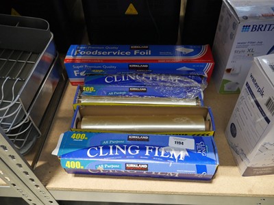 Lot 1194 - 4 boxed rolls of clingfilm and large roll of foil