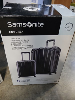 Lot 1216 - Boxed 2 piece Samsonite luggage set in black