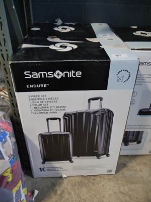 Lot 1217 - Boxed 2 piece Samsonite luggage set in black