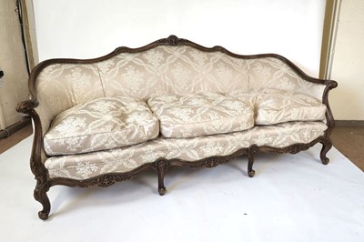 Lot 28 - An early 20th century reproduction walnut...