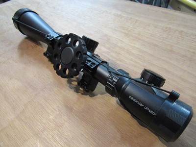 Lot 1223 - A Besonder Optisch rifle scope with mounts