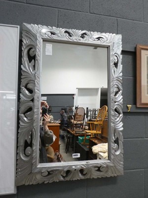 Lot 5065 - Rectangular mirror in ornate silver frame