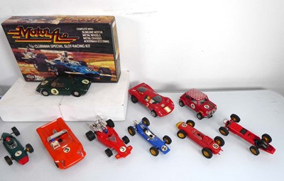 Lot 167 - Fourteen Scalextric and other slot cars...