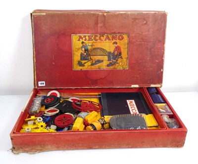 Lot 169 - A card Meccano box containing a selection of...