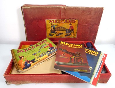 Lot 169 - A card Meccano box containing a selection of...