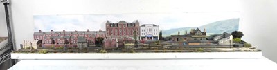 Lot 186 - An N gauge train layout including street scene,...