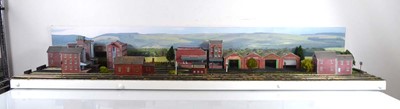 Lot 186 - An N gauge train layout including street scene,...