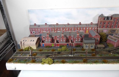 Lot 186 - An N gauge train layout including street scene,...