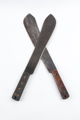 Lot 84 - Two war issue machetes: 14½ ins bolo blade by...