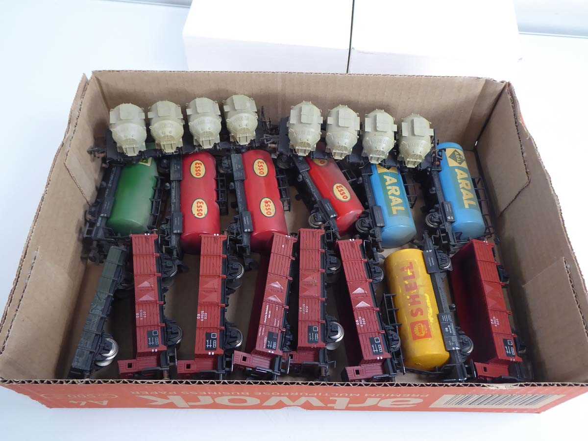 Lot 197 - A group of OO gauge rolling stock, trackside...