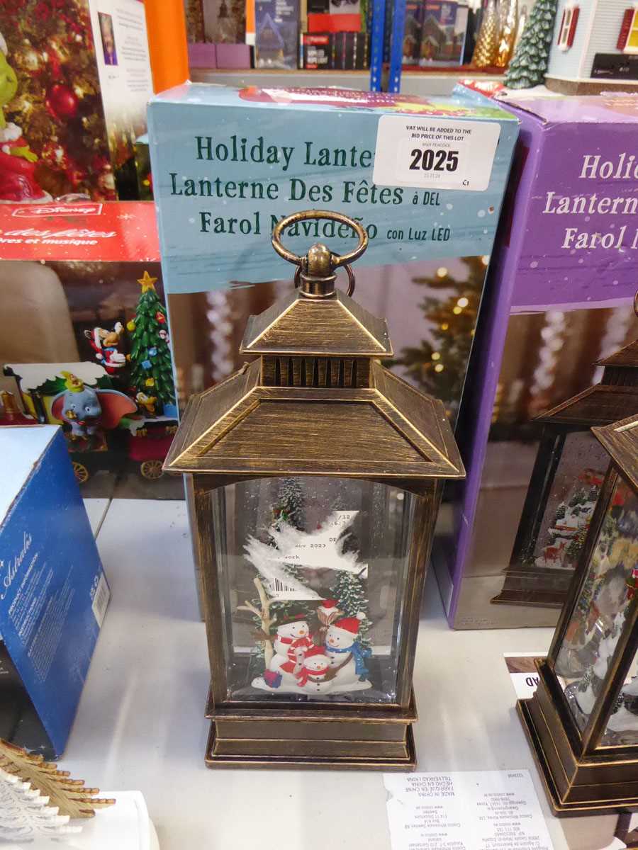 Lot 2025 - 2 battery operated snow globe style LED...