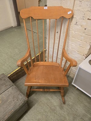 Lot 16 - A modern spindle back rocking chair