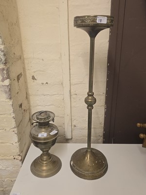 Lot 18 - A brass oil lamp together with a brass...