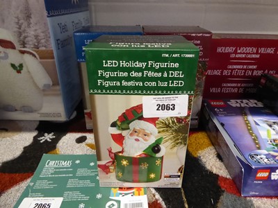 Lot 2063 - Set of 3 LED battery operated holiday figurine...