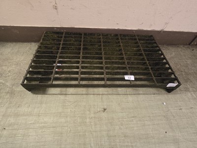 Lot 32 - A metalwork doormat boot scrape