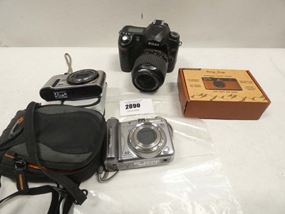 Lot 2090 - Nikon D50 DSLR plus 3 other digital cameras