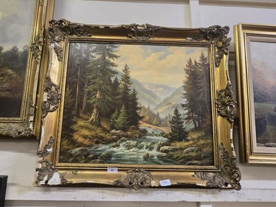 Lot 48 - A gilt framed oil on canvas of river running...