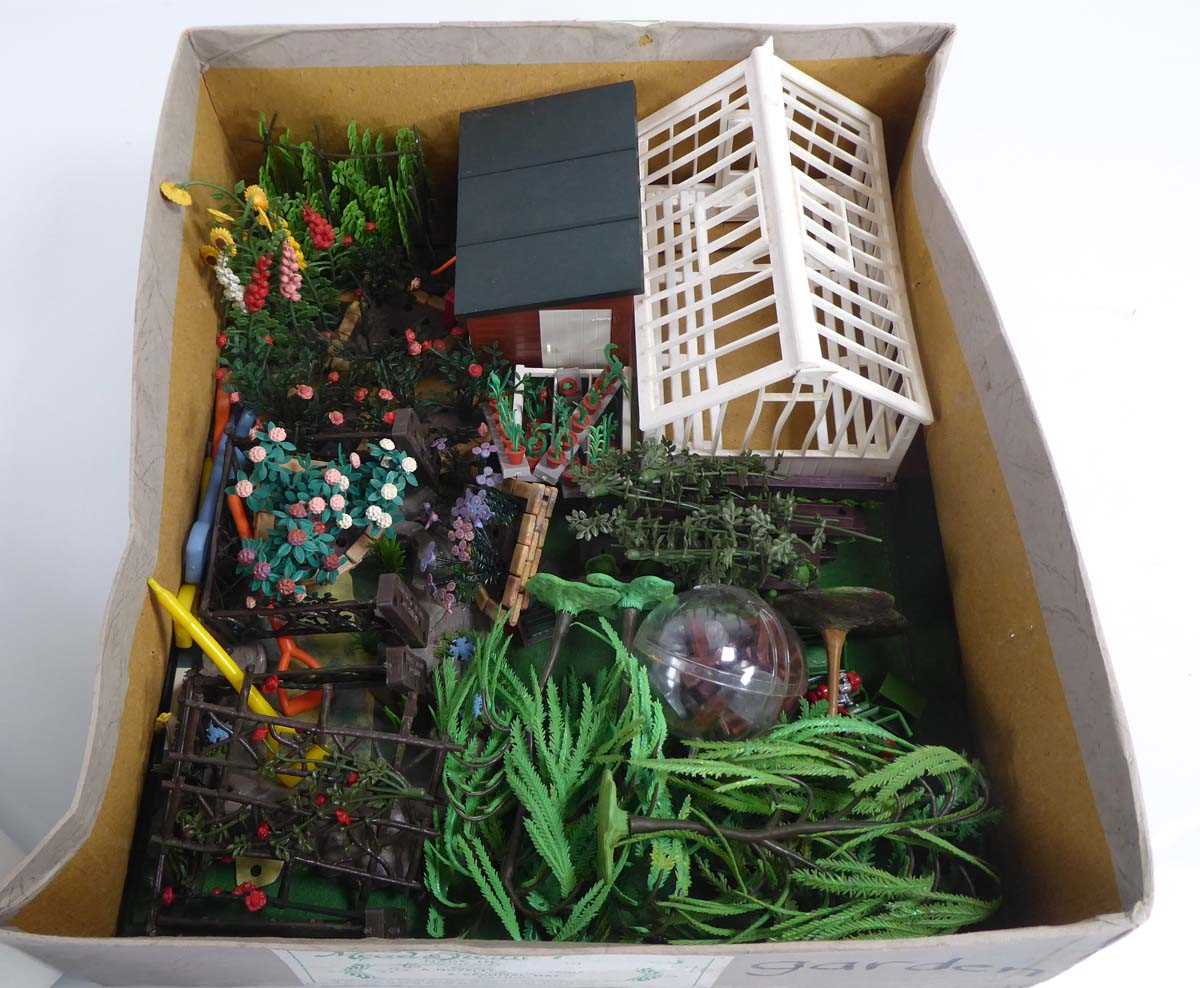 Lot 202 - A group of Britains plastic garden accessories...