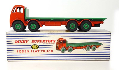 Lot A Dinky 902 Foden flat truck, orange/green,...