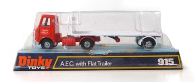 Lot A Dinky 915 AEC with flat trailer, blister pack