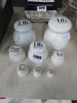 Lot 5009 - 8 porcelain weights