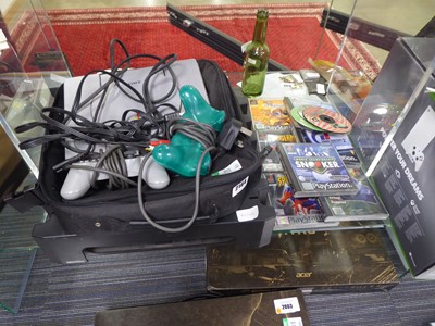 Lot 2164 - Sony PlayStation 1 with accessories, including...