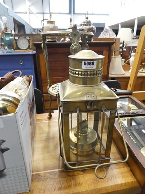 Lot 5088 - (2) Brass 2-tier trivet, plus oil lamp