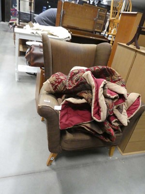 Lot 5144 - Brown fabric wingback armchair