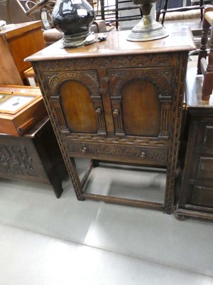 Lot 5159 - Oak double door cupboard on raised supports