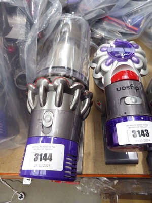 Lot 3144 - Handheld Dyson V10 with pole, head, battery,...