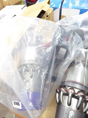 Lot 3145 - Handheld Dyson V10 with battery, charger and...