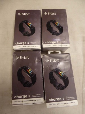 Lot 2211 - Bag containing 4boxed Fitbit Charge 5's