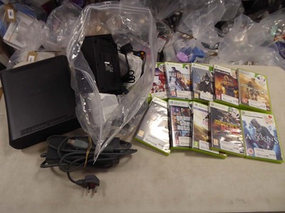 Lot 2227 - Xbox 360 with controller, charger, and games...