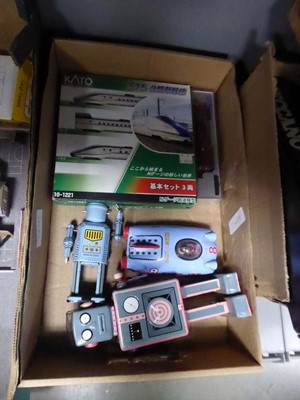 Lot 2505 - Box containing tin robots and vehicles, plus...