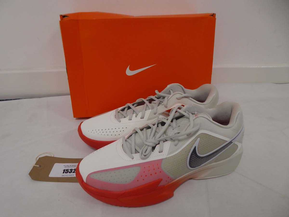 Lot 1532 - Boxed pair of Nike G.T. cut cross trainers in...