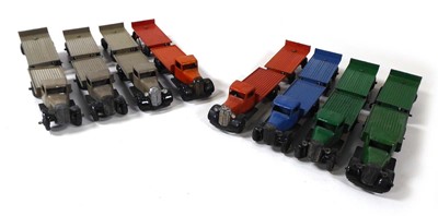 Lot Eight Dinky 25c flat trucks and trailers,...